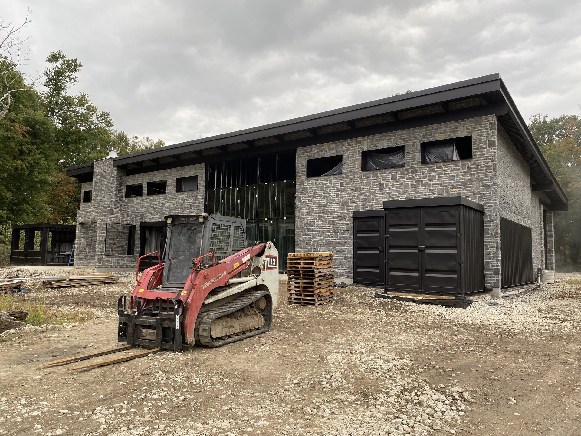 Completed container house exterior — final painted result