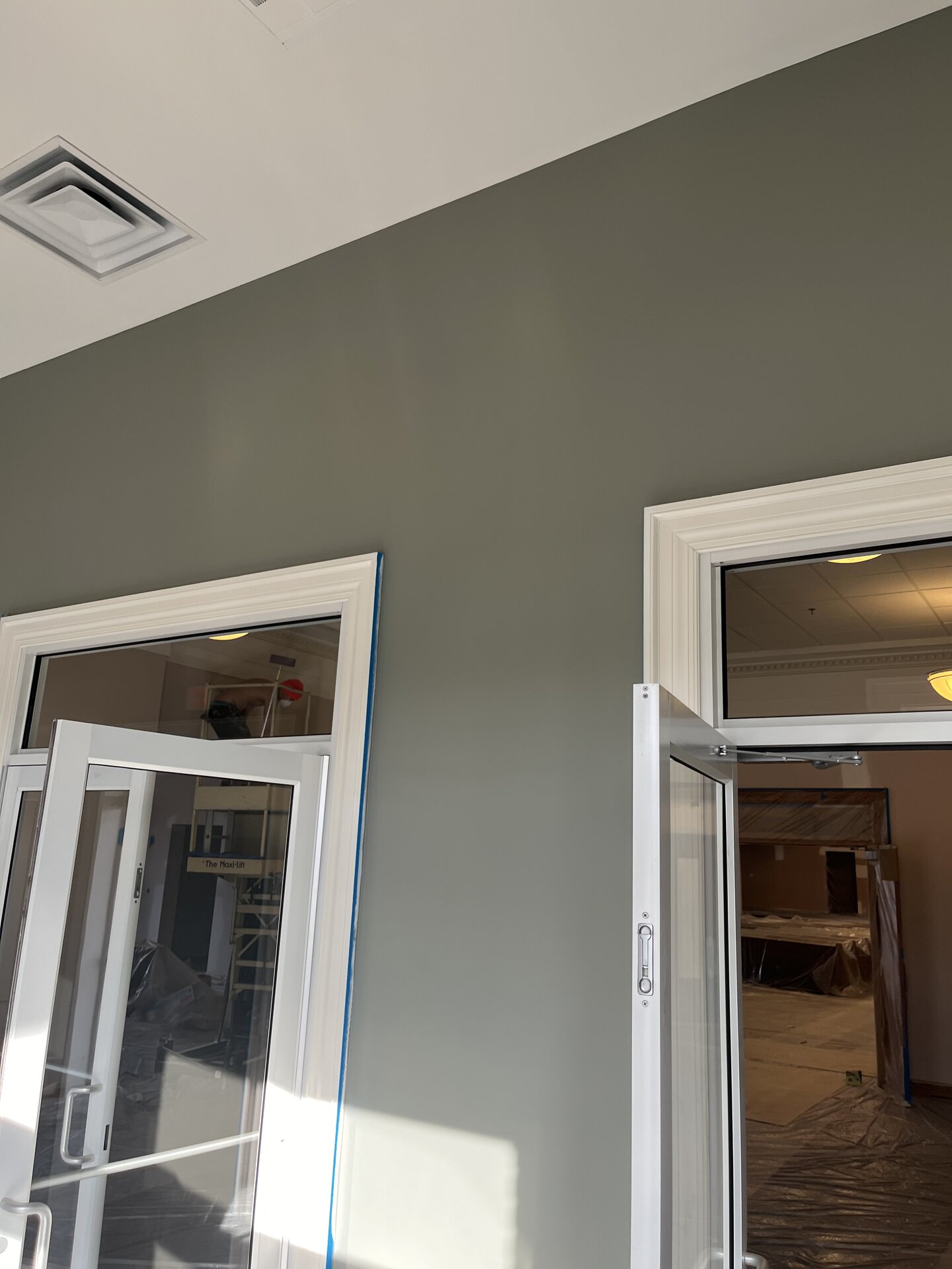 Church auditorium balcony area — wall and ceiling painting