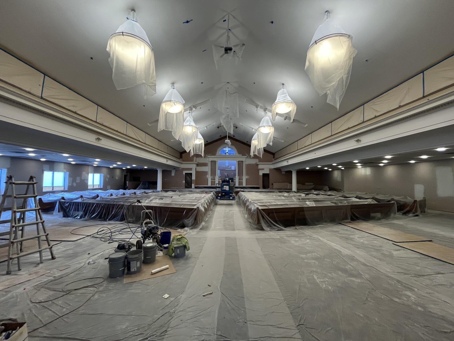 Church repaint — final wall sections being completed