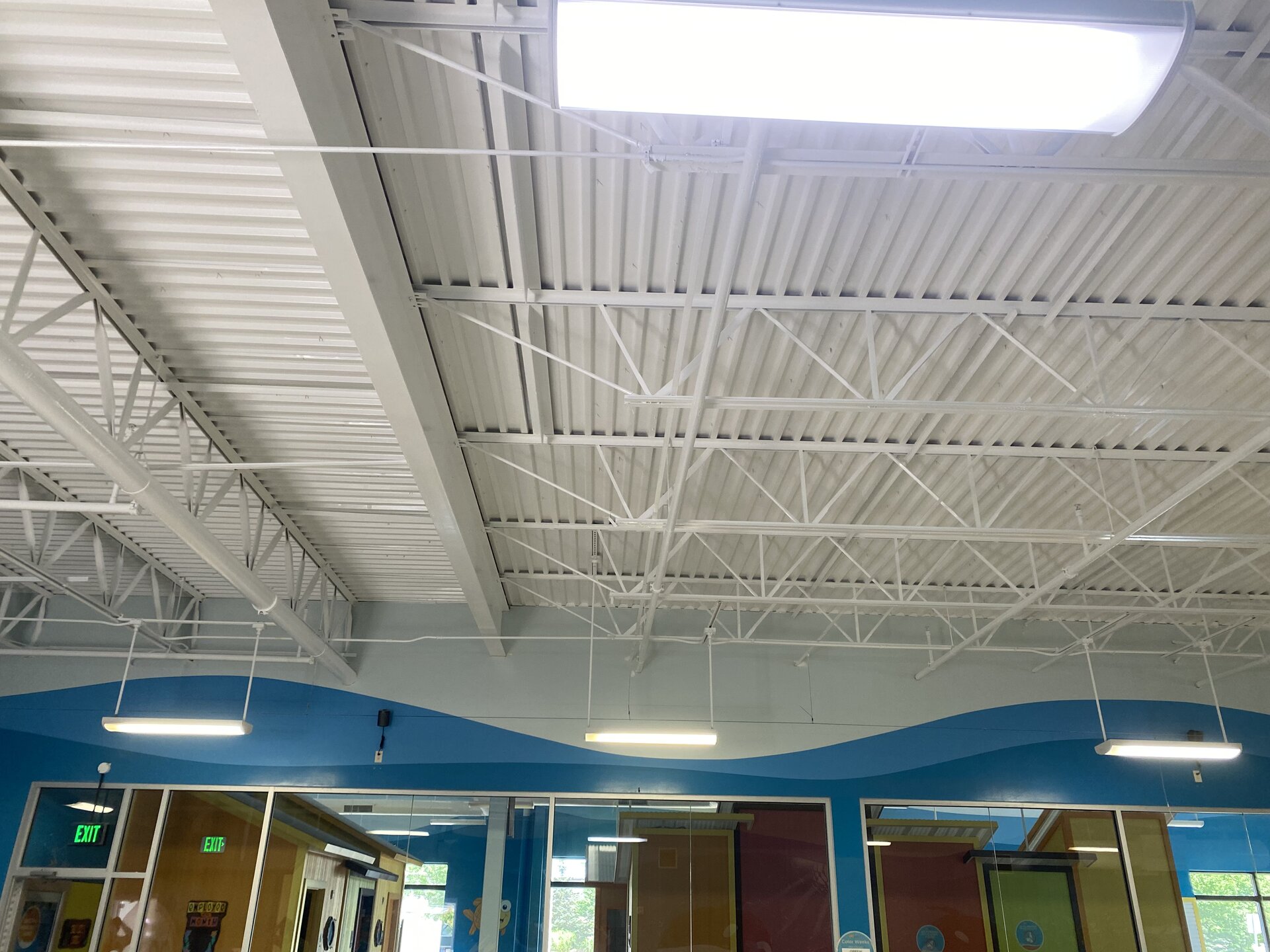 Swim school pool area — completed interior repaint with moisture-resistant commercial coating