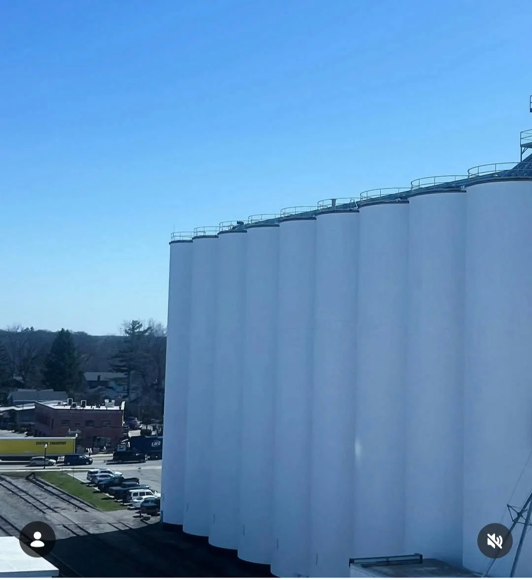 Jiffy tank farm — aerial view of completed freshly painted white silos