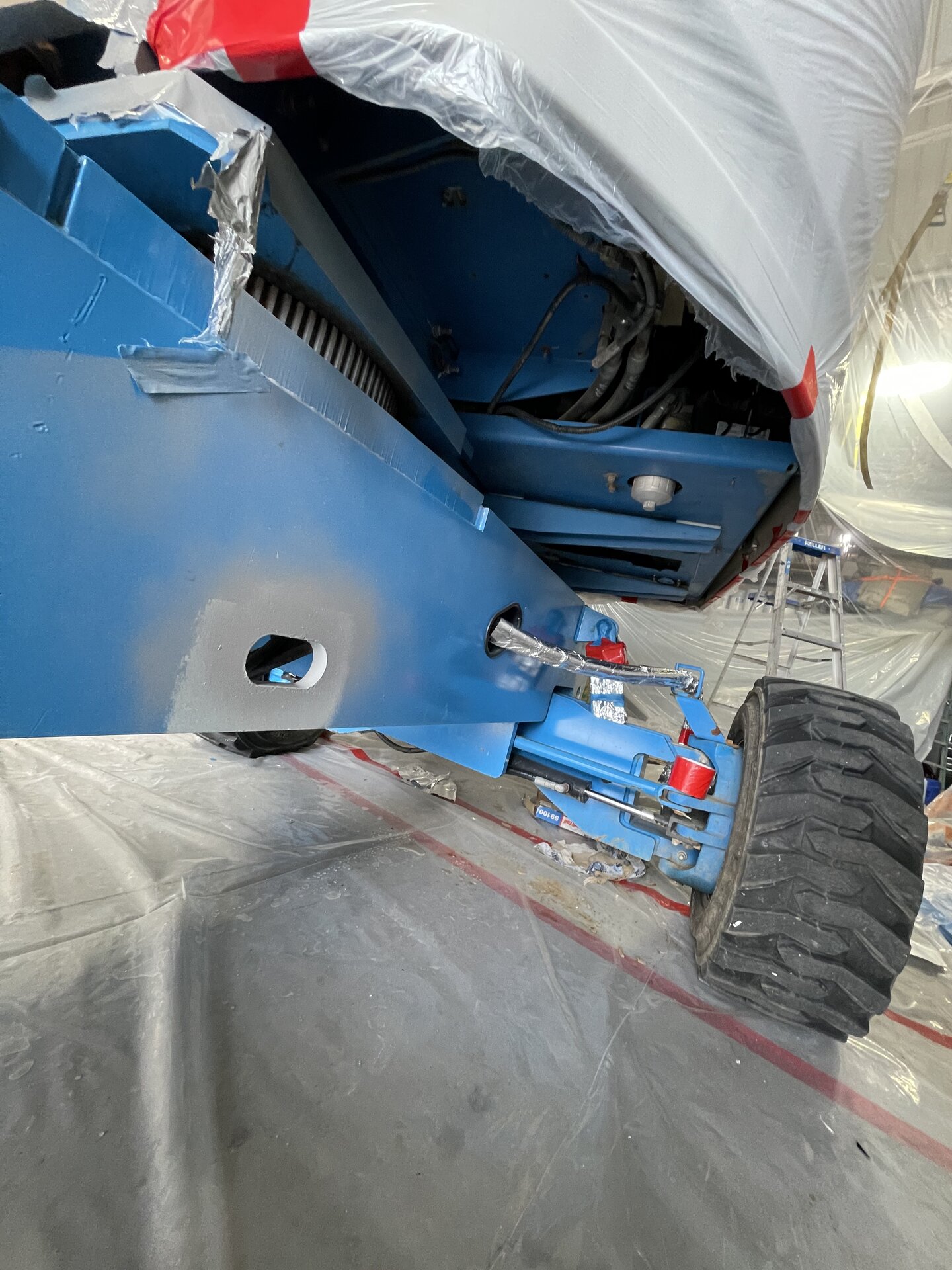 McCallister Equipment fleet — multiple lifts repainted and ready for rental lot