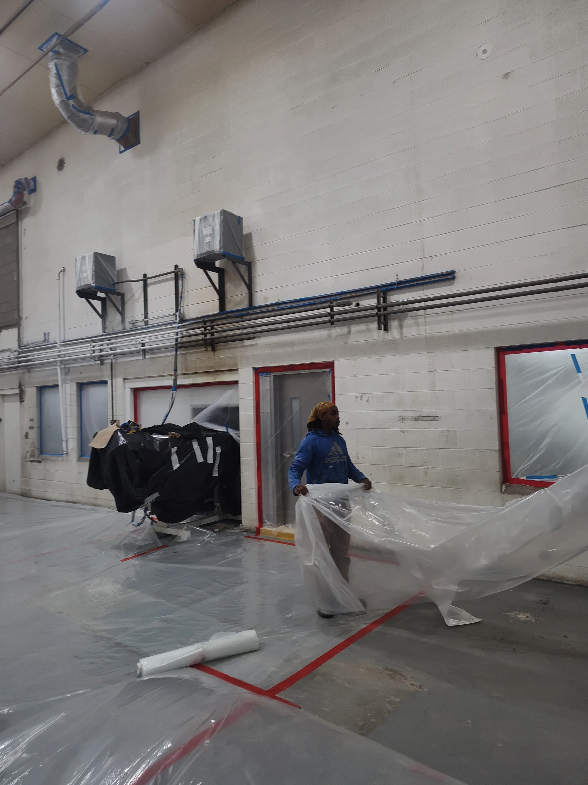 Powdered milk production room — bright white walls and clean finish after full interior repaint