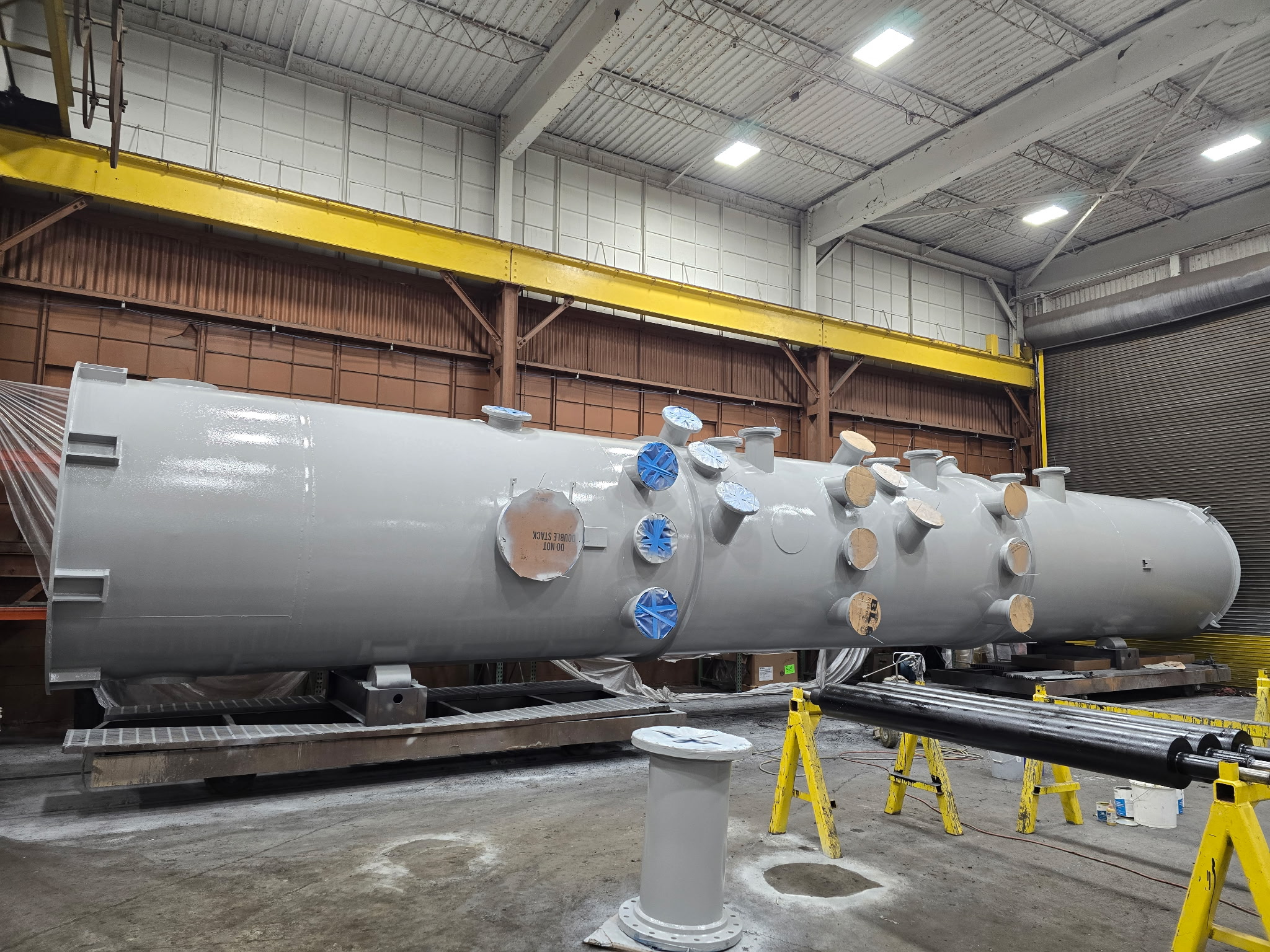 Wide angle showing full silo length with flanged ports and finished coating