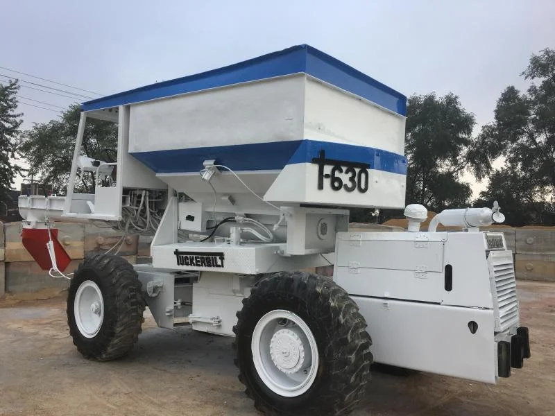 Tuckerbilt T-630 concrete buggy after restoration, fresh white and blue finish