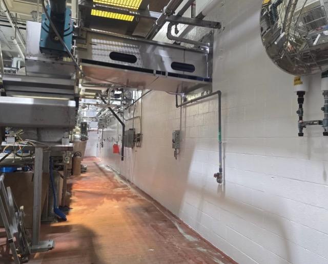 Vlasic Pickle facility — freshly painted white walls throughout production area